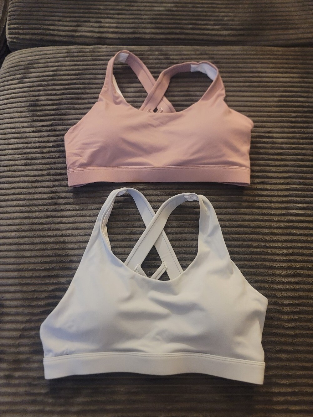 NWOT. 2 RUNNING GIRL SPORTS BRAS.
